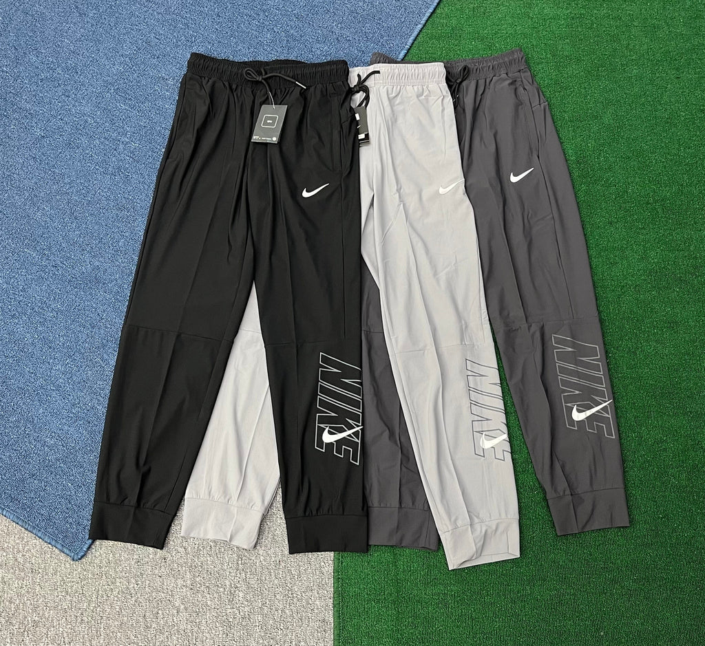 Nike Men's Dri-FIT Lightweight Running Joggers – Graphic Tapered Athletic Sweatpants