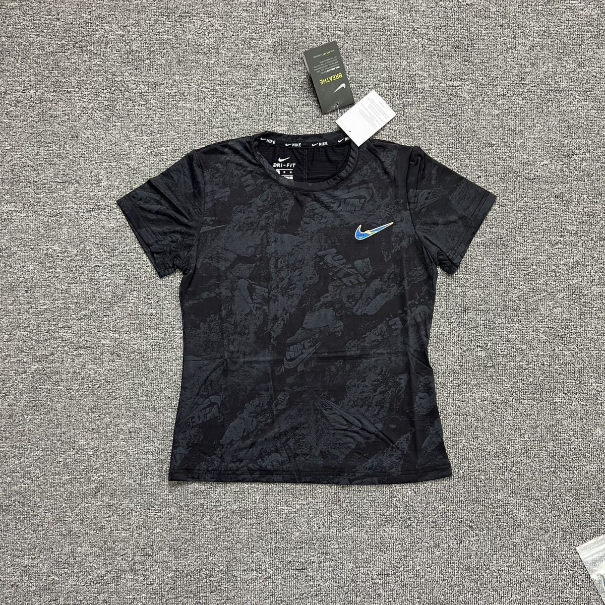 Nike Women's Dri-FIT Breathe All-Over Print Running T-Shirt – Short Sleeve Athletic Tee