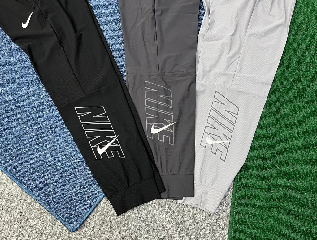 Nike Men's Dri-FIT Lightweight Running Joggers – Graphic Tapered Athletic Sweatpants
