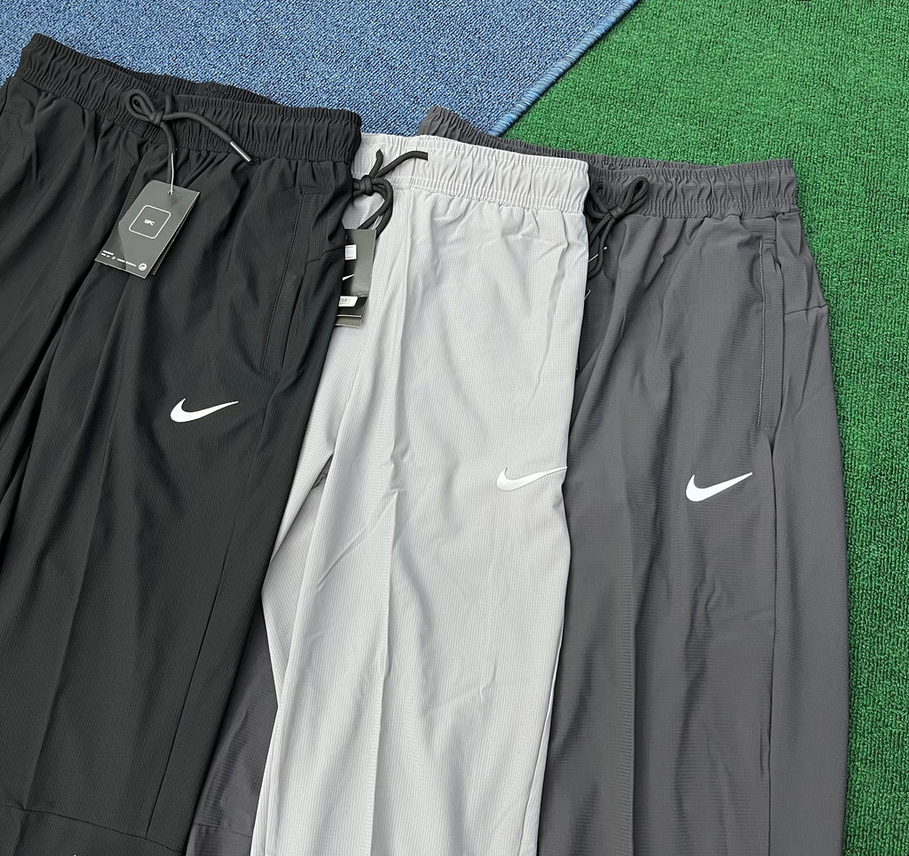 Nike Men's Dri-FIT Lightweight Running Joggers – Graphic Tapered Athletic Sweatpants